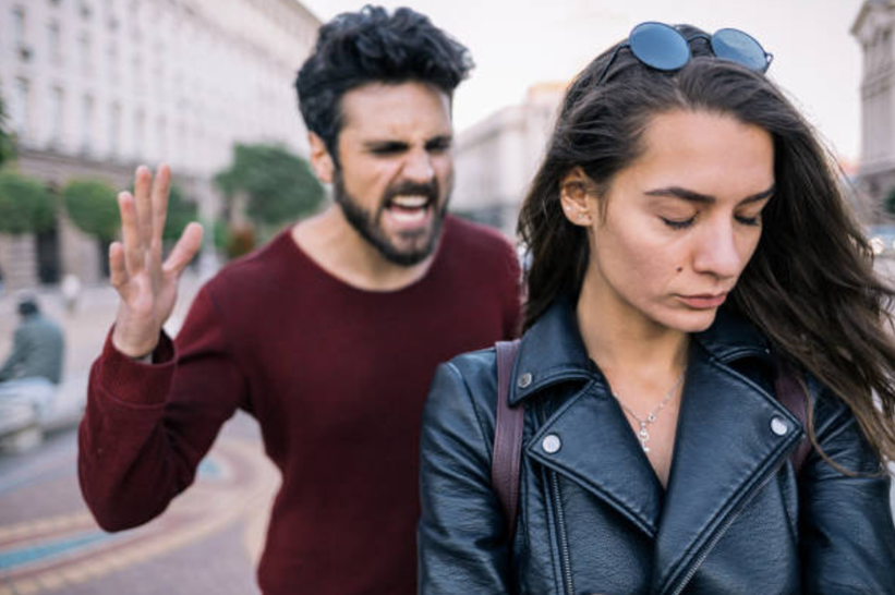 A man shouting at a woman during a heated argument, illustrating the need for a christian perspective on toxic relationships and boundaries.