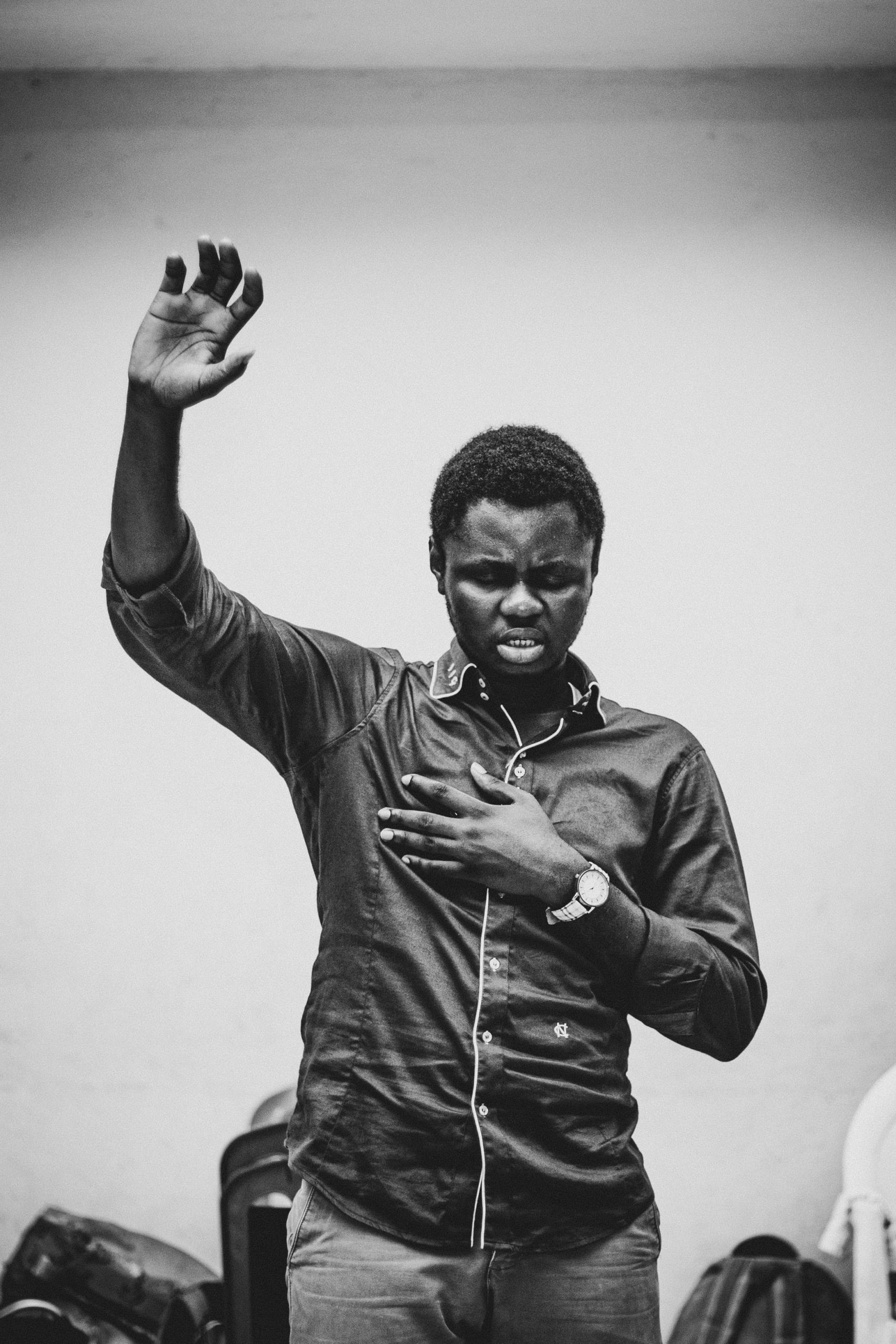 A man praying in a room, establishing a daily routine with God through morning and evening spiritual habits.